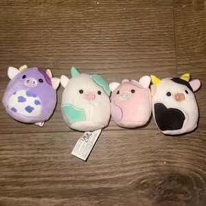 Lot of ‘Squishville’ cows. 

Two have tags missing (pictured)